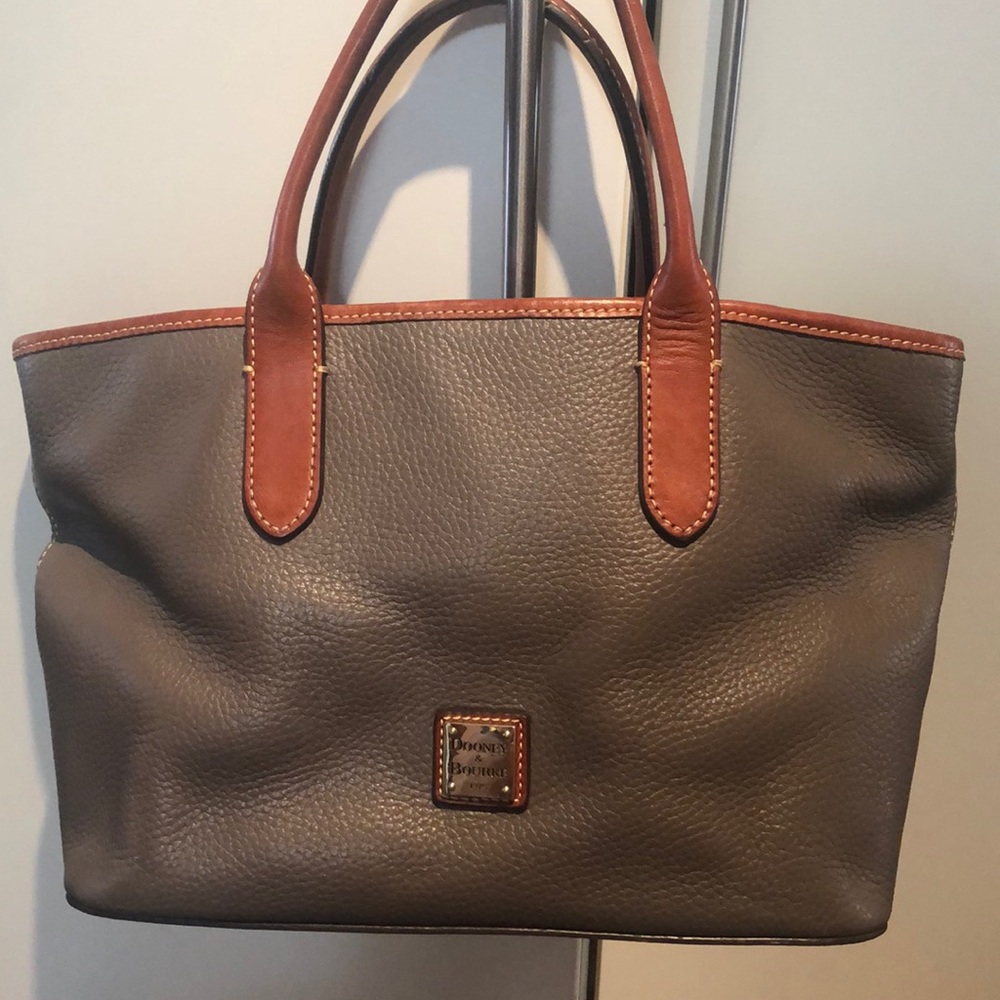 Dooney & Bourke Gray leather bag with Brown trim.